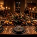 Moody Thanksgiving table setting featuring slate chargers, brass cutlery, and dark candles in a cozy dining room.