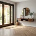 A modern and beautifully designed entryway featuring durable herringbone tile flooring, a console table, and soft natural light.