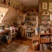 Cozy cottagecore attic craft room featuring floral wallpaper, vintage sewing table desk, and wicker baskets