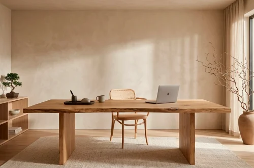 A serene Japandi style home office featuring a live-edge wooden desk, limewash walls, and soft natural sunlight.