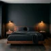 Dark moody minimalist bedroom with charcoal walls and warm amber lighting