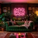 Eclectic living room featuring a pink neon sign above a green velvet sofa with vintage decor and lush plants.
