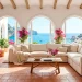 Sun-drenched Mediterranean living room featuring white plaster walls, terracotta tiles, and a cream linen sofa overlooking the ocean.
