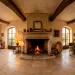 Rustic living room with chunky limestone fireplace and warm stone accents