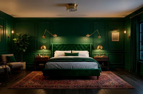 Luxurious moody bedroom featuring emerald green walls and brass wall sconces over a velvet bed.