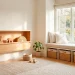 Beautifully organized minimalist kids bedroom with wooden toy rotation station and clear floor space