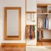 Stylish small dressing room featuring clever over-the-door organizers and modern minimalist wardrobe storage.