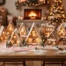 Wide view of a beautifully designed gingerbread village with modern A-frame houses and glowing fairy lights on a wooden table