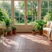 Breathtaking sunroom interior featuring intricate Moroccan patterned floor tiles in navy and terracotta with rattan furniture.