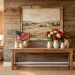 Rustic farmhouse living room showcasing Memorial Day wall art over a vintage console table.