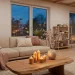 Minimalist Japandi living room decorated for Valentine's Day with warm candles and cherry blossoms