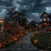 High-end outdoor Halloween decorations standing strong in a stormy autumn yard with glowing orange lights.