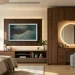 Modern bedroom TV wall with seamlessly integrated makeup vanity and soft LED lighting.