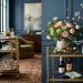 Elegant adult Easter bar cart setup with gold accents and spring florals in a sophisticated modern home.