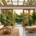 Lush indoor tropical oasis with natural rattan furniture and vibrant green monstera plants.