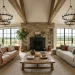 Modern farmhouse living room featuring reclaimed wood beams and matte black metal accents for an industrial chic vibe.