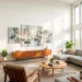 Large abstract wall art set hanging in a bright modern living room with double-height ceilings