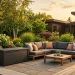 Sleek heavy-duty deck box protecting outdoor cushions next to a modern patio sectional sofa at golden hour