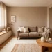 Cohesive monochrome small living room in warm taupe and cream with textured decor and sleek furniture.