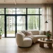 Bright Scandinavian living room featuring a cream boucle sofa, warm oak floors, and a cozy modern fireplace.