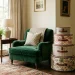 A beautiful living room featuring a stack of vintage-style hat boxes used as chic home decor next to a velvet armchair.