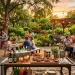 Beautiful outdoor serving cart loaded with drinks on a sunny patio
