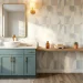 Modern budget-friendly powder room featuring green peel-and-stick wallpaper and a gold mirror.