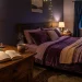 Cozy twilight bedroom with dried lavender sprigs on a wooden nightstand for a relaxing nighttime vibe