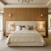 Elegant master bedroom featuring a custom Italian upholstered bed in cream velvet with marble nightstands.