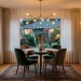 Small cozy dining room design featuring a round walnut table and velvet chairs under warm lighting.