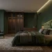 Luxurious modern 2026 bedroom with deep green walls and an oversized velvet headboard