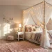 Cozy girl's bedroom featuring a white canopy bed with sheer drapes, fairy lights, and a plush pink rug.