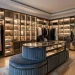 Luxurious modern dressing room closet with a center island and LED lighting