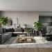A modern living room showcasing sophisticated grey tones with brass accents and warm lighting.