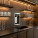 Custom dark oak cabinetry featuring a built-in home hydration station and illuminated glass shelves.