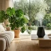 A modern aesthetic room humidifier on a travertine table in a stylish living room